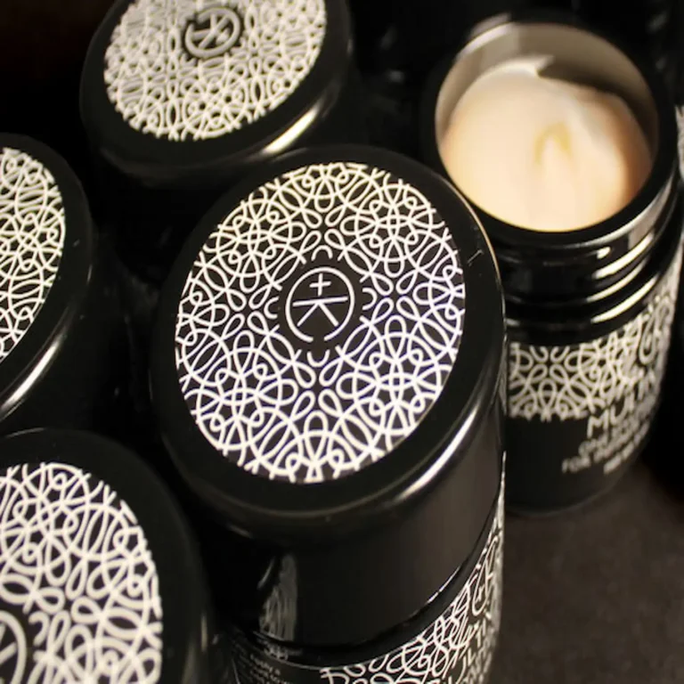 a birds eye view of several jars of multiverse by cult + king, showing the packaging and texture of the product