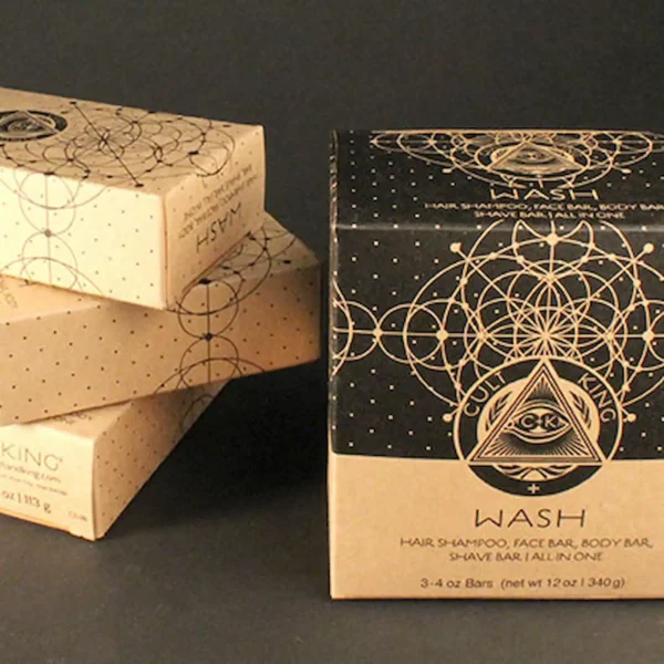 Cult+King Wash bar soap packaging with black and kraft boxes featuring geometric designs.