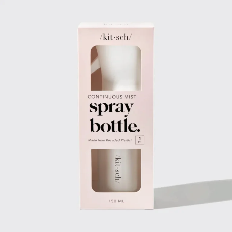 superfine continuous mist white spray bottle in a peachish box with keyhole cutouts on the front and black text on front.