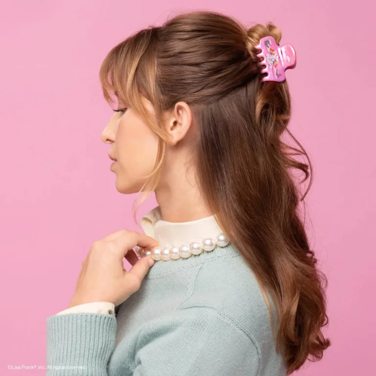 pink background with a woman in a half up half down lisa frank pink angel kitty claw clip