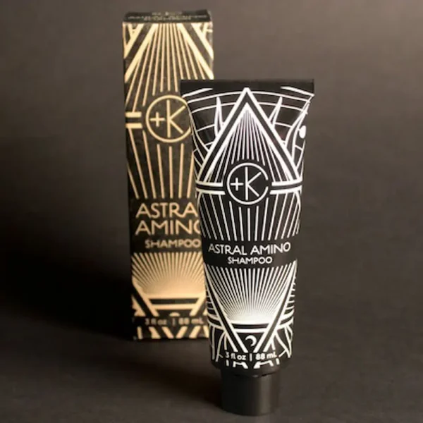 tube of astral amino shampoo that is mini sized for clean sustainable shampoo