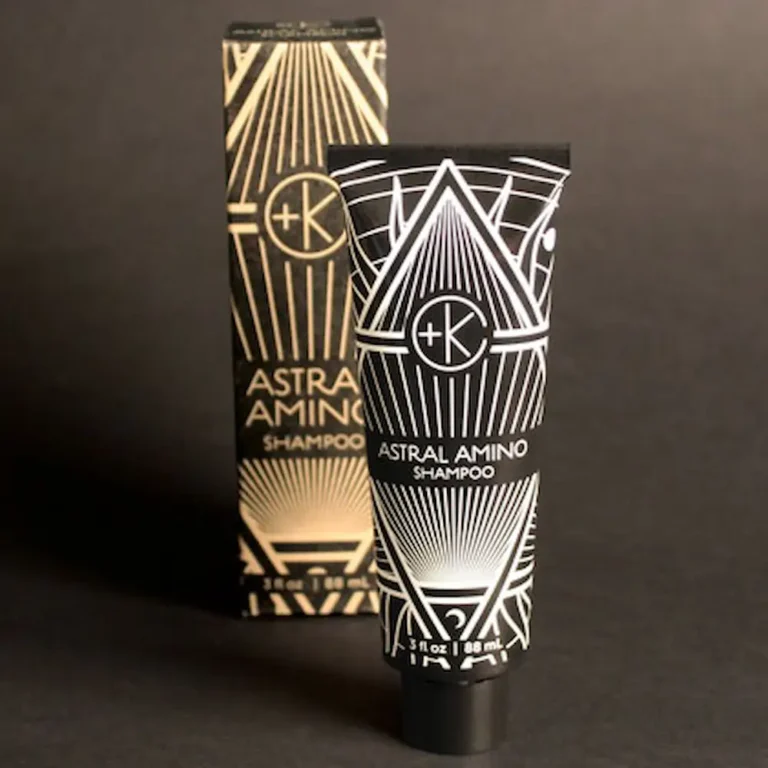 tube of astral amino shampoo that is mini sized for clean sustainable shampoo