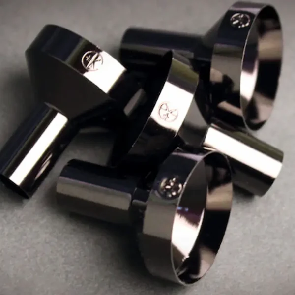 a pile of black funnels from cult + king for refilling tonik and superwater bottles