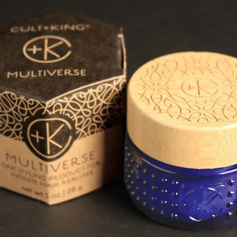 a colbalt blue pot with a bamboo lid next to it's cardboard packaging from cult + king showing multiverse product mini