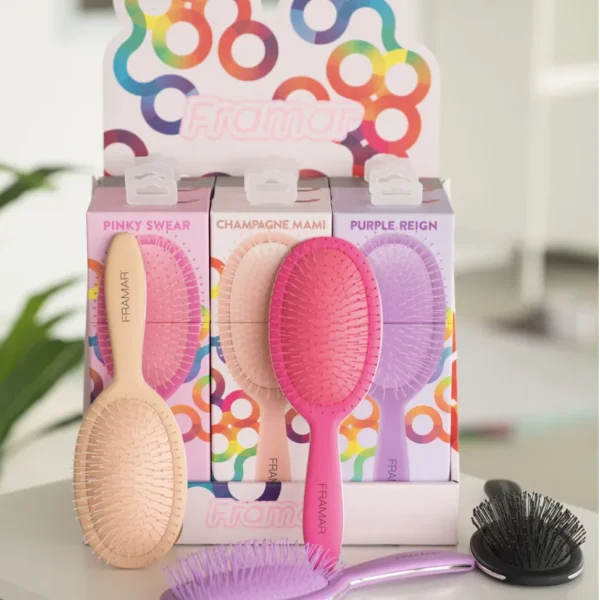 Framar detangling brushes in pink champagne and purple display
