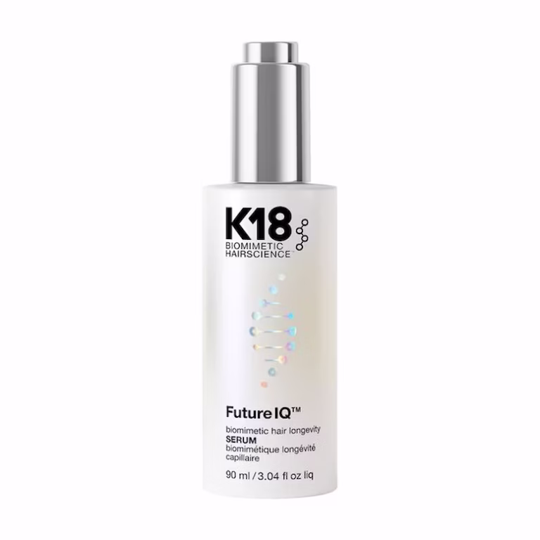 K18 Future IQ biomimetic hair longevity serum in a white bottle with a silver dropper
