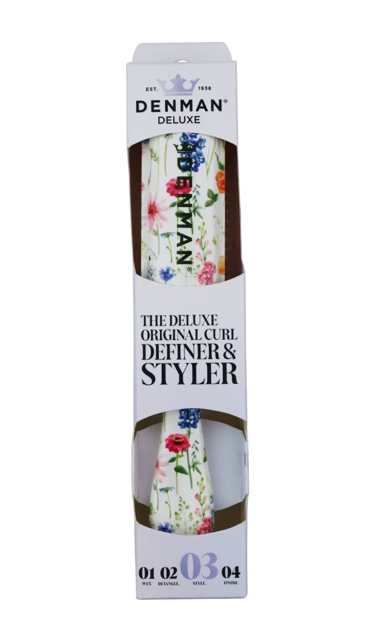 The Denman D3 Deluxe Original Curl Definer styling brush in the Floral Fantasies print, displayed inside its official white retail packaging box.